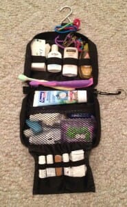 My kids' basic travel toiletry kit is a tiny hanging one from Samsonite. Even though it's small, its various pockets and elastic straps hold tons of stuff, from their various shampoos and soaps to hair accessories, nail files and clippers, and a Neutrogena sunscreen stick.