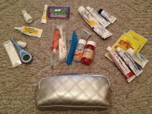I keep everything my kiddos might need for most medical emergencies - from a thermometer (with plenty of probe covers!) to Essie's various prescription skin lotions and diaper-rash creams - in a separate container from their other toiletries. This way, it's easier to stuff into my purse for road trips, or a carry-on for plane travel. More than once, I've been glad to have easy access to it while in the car or waiting in an airport.