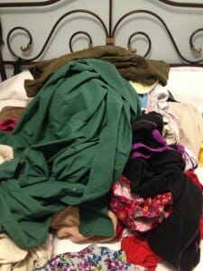 Can you find the two preschoolers hidden under this mountain of laundry?