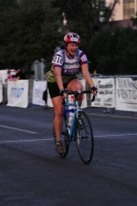 Crossing the finish line after my first century ride, a 109-mile trip through the Arizona desert, in 2008.