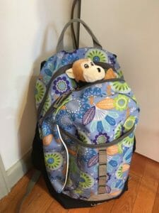 momo-in-kimmies-backpack