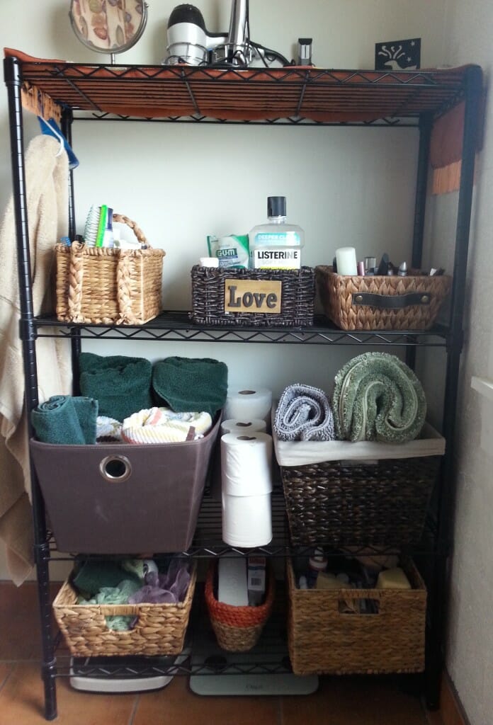 Baskets don't have to be all matchy-matchy, all the time, as my amazing sister-in-law Alicia has demonstrated in this superb bathroom collection. This assortment of baskets in her tiny apartment's bathroom works so well as a linen-closet-out-in-the-open precisely because each basket is unique.