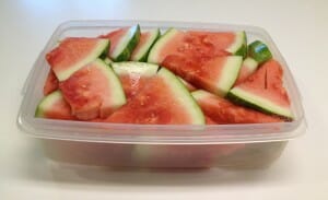 Cutting the whole watermelon into wedges makes it much more likely that we'll eat our fresh melon before it spoils in the back of the fridge, because it's easier to store wedges in a large plastic container.