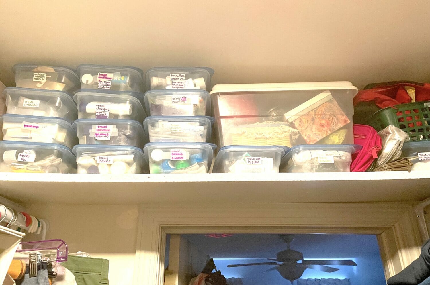 Overhead shelves are my favorite small space storage hack, and make for easy DIY organizing small spaces cheap.