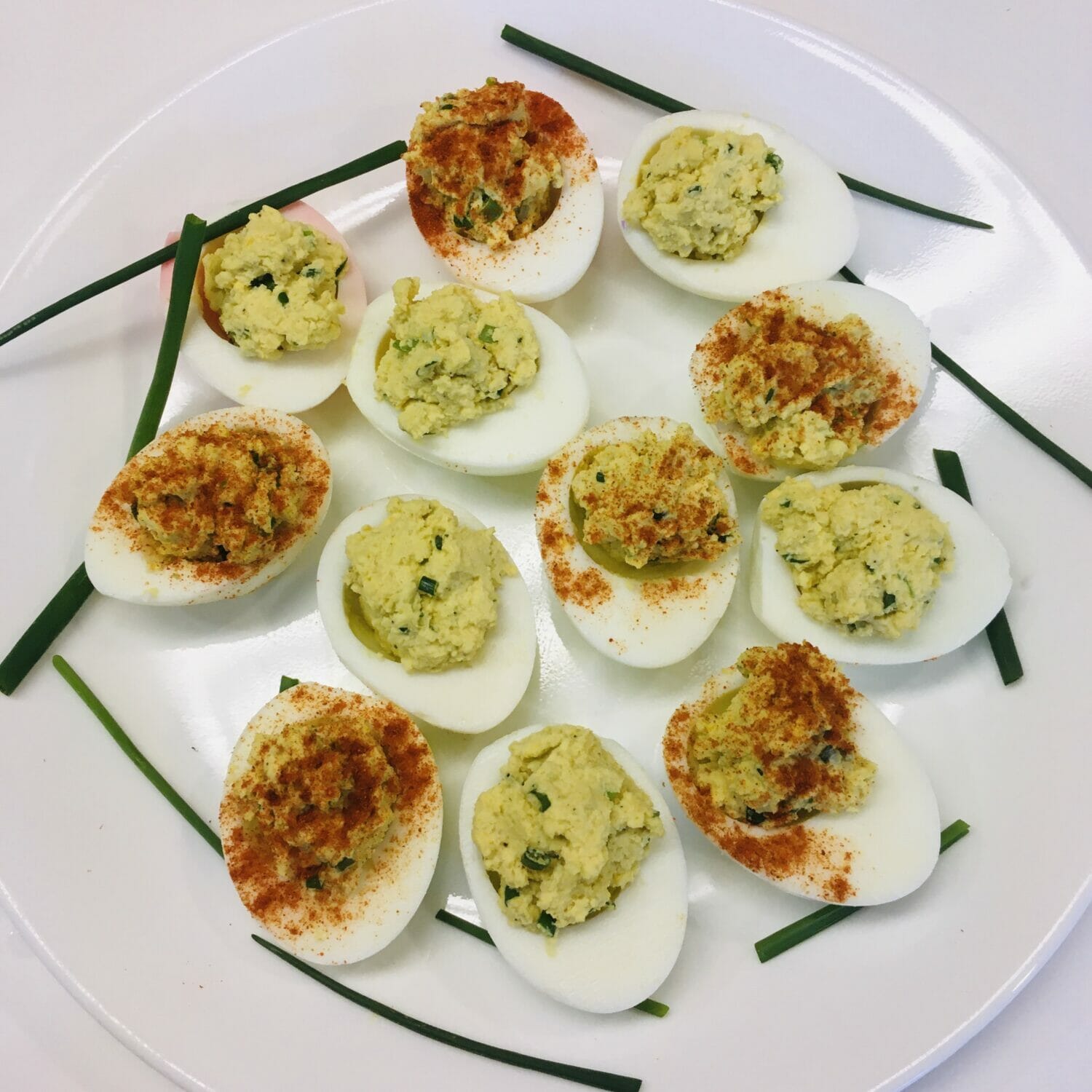 This delicious Dijon deviled eggs recipe is the perfect Easter appetizer - so easy that kids can make, yet elegant enough for holiday meals.