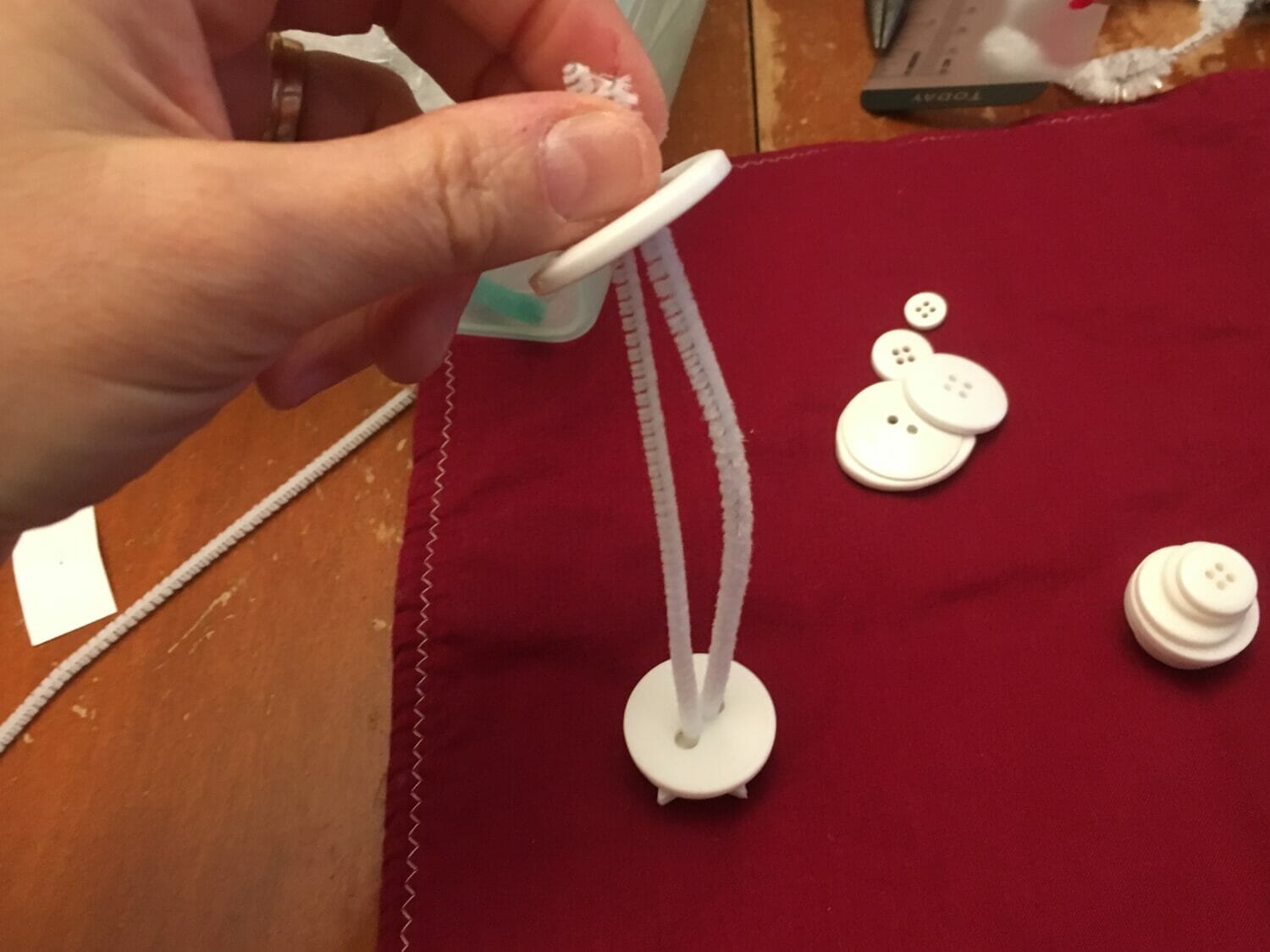 These cute button snowman ornaments make great DIY Christmas gifts while helping little hands practice sorting and fine motor skills.